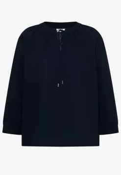 Blouse à manches 3/4 avec col fendu en couleur unie