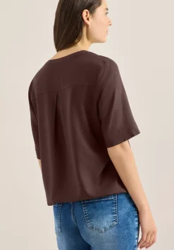 Blouse à manches 3/4 avec col fendu