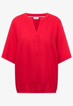 Blouse à manches 3/4 avec col fendu