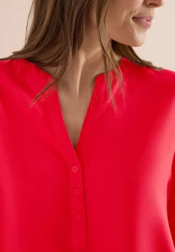 Blouse à manches 3/4 avec col fendu