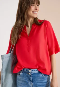 Blouse à manches 3/4 avec col fendu