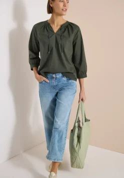 Blouse à manches 3/4 avec col fendu en couleur unie