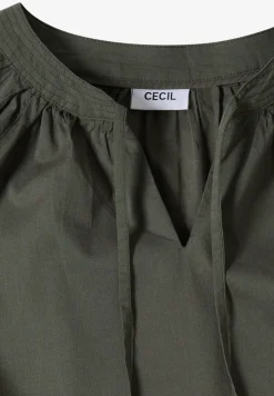 Blouse à manches 3/4 avec col fendu en couleur unie