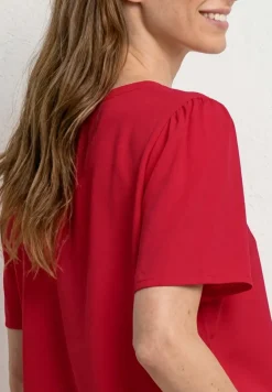 Blouse à manches courtes avec col fendu et boutons