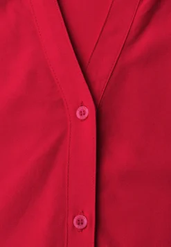 Blouse à manches courtes avec col fendu et boutons