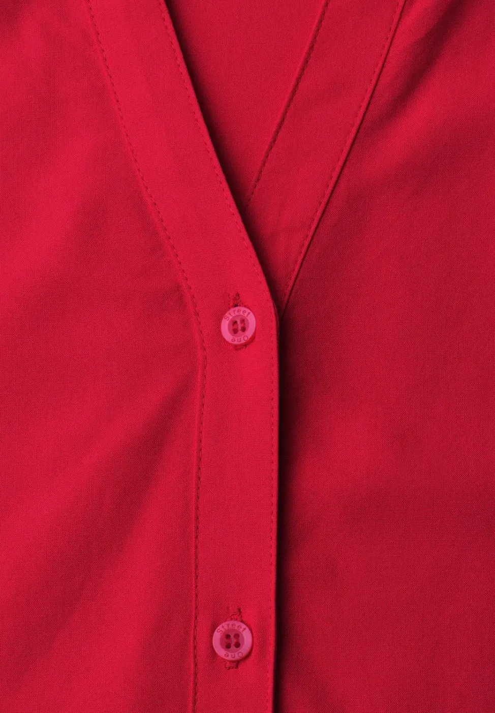 Blouse à manches courtes avec col fendu et boutons
