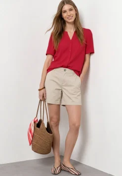 Blouse à manches courtes avec col fendu et boutons