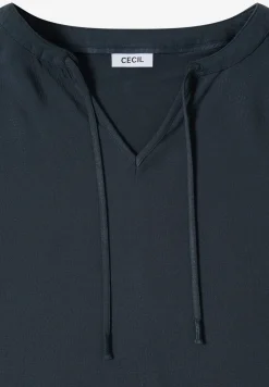 Blouse à manches courtes avec mélange de structures