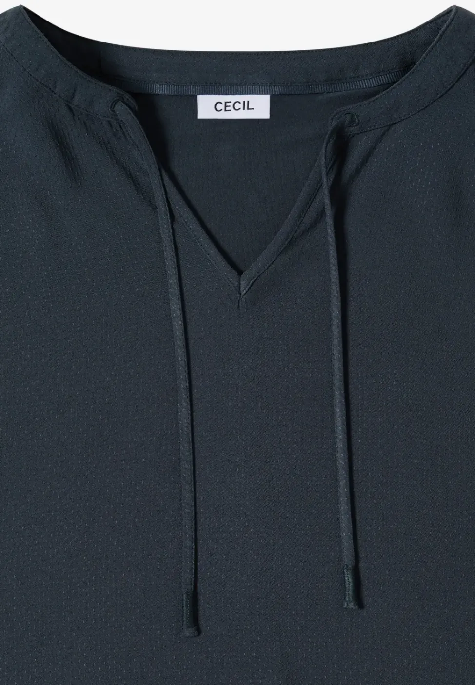 Blouse à manches courtes avec mélange de structures