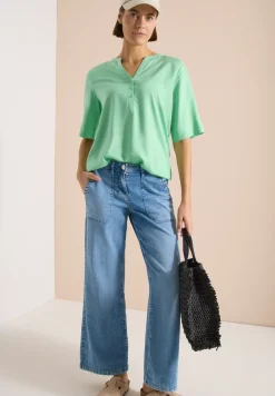 Blouse à manches courtes avec col fendu