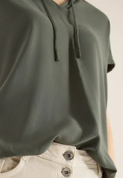 Blouse à manches courtes avec mélange de structures