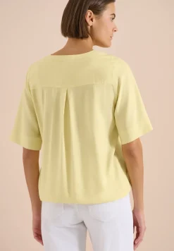 Blouse à manches courtes avec col fendu