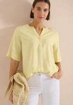 Blouse à manches courtes avec col fendu
