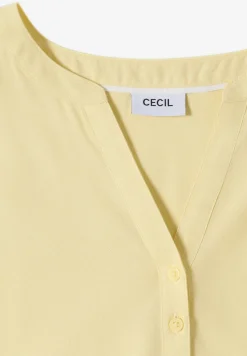 Blouse à manches courtes avec col fendu