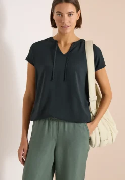 Blouse à manches courtes avec mélange de structures