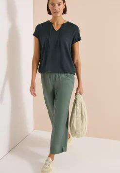 Blouse à manches courtes avec mélange de structures