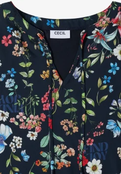 Blouse à manches courtes avec un mélange de structures et un imprimé