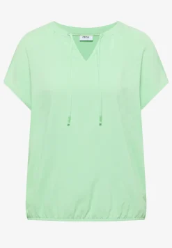 Blouse à manches courtes avec mélange de structures