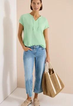 Blouse à manches courtes avec mélange de structures