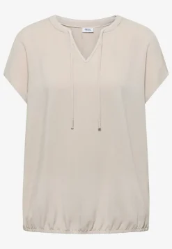 Blouse à manches courtes avec mélange de structures