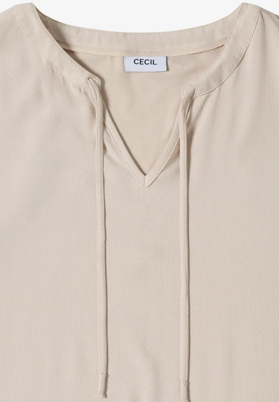 Blouse à manches courtes avec mélange de structures