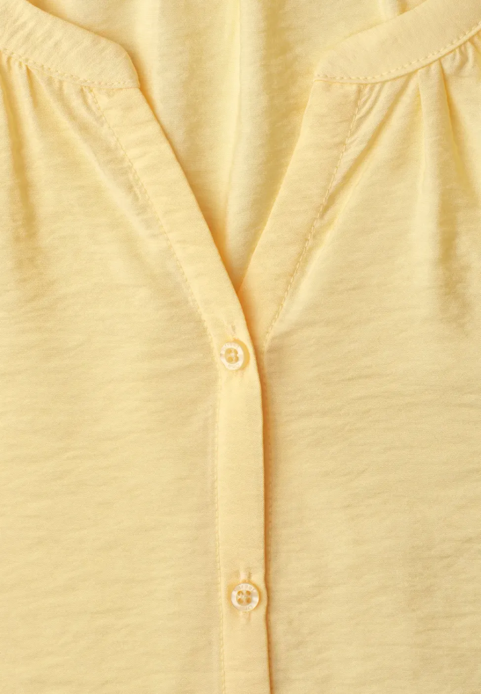 Blouse à manches courtes avec col fendu et boutons