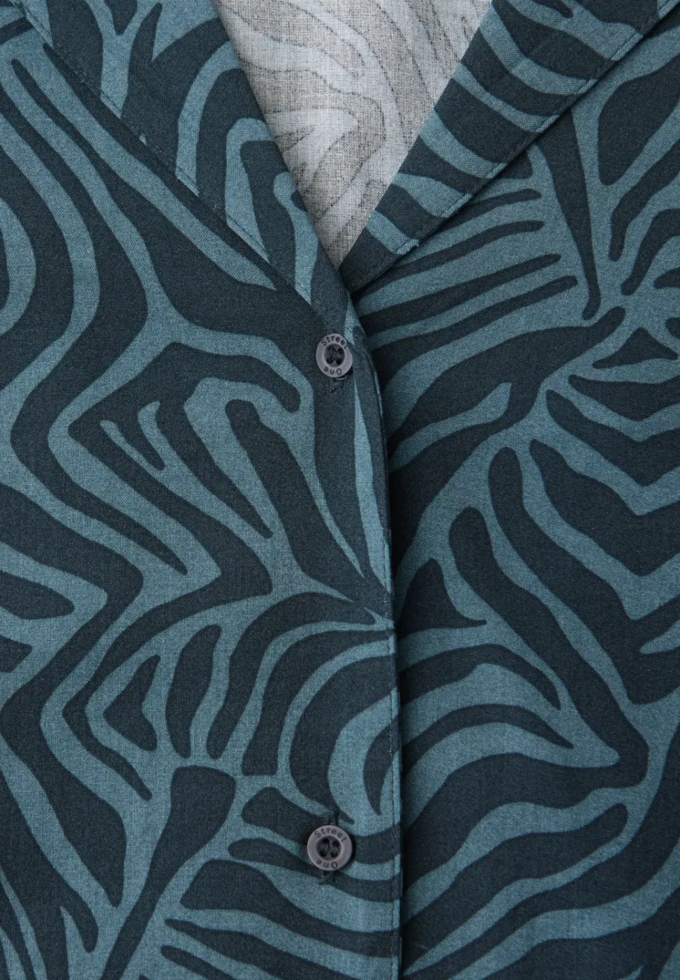Blouse à manches courtes avec col bowling