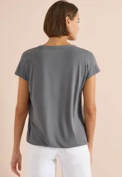Blouse à manches courtes avec mélange de structures