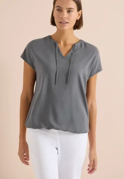 Blouse à manches courtes avec mélange de structures