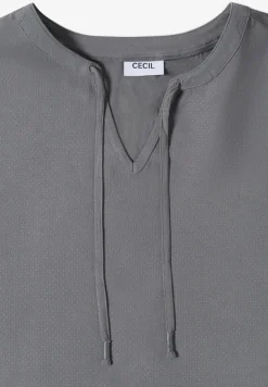 Blouse à manches courtes avec mélange de structures