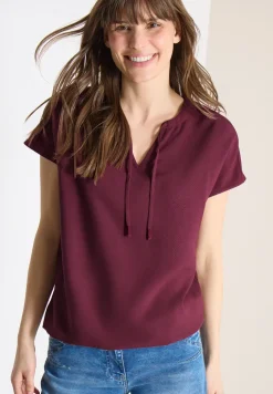 Blouse à manches courtes avec mélange de structures