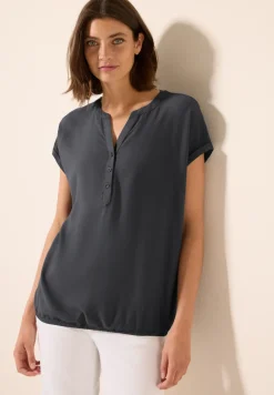 Blouse à manches courtes en couleur unie