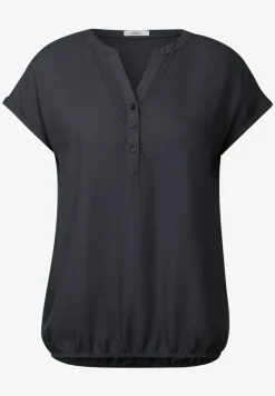 Blouse à manches courtes en couleur unie