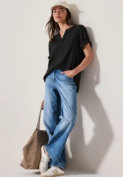 Blouse à manches courtes en couleur unie