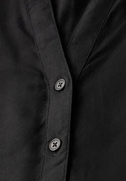 Blouse à manches courtes en couleur unie