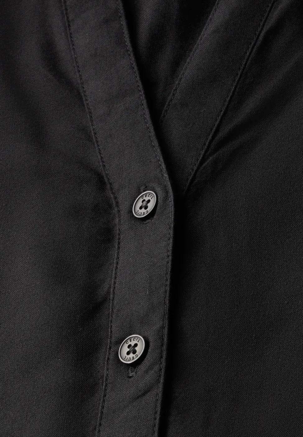 Blouse à manches courtes en couleur unie