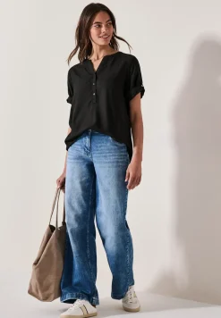 Blouse à manches courtes en couleur unie