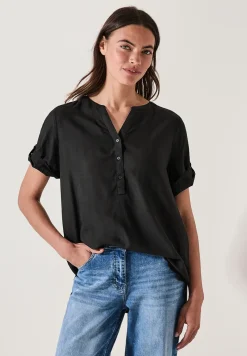 Blouse à manches courtes en couleur unie
