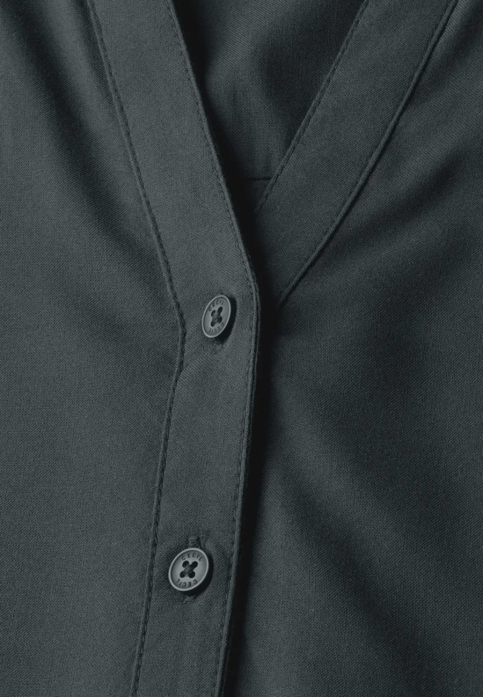 Blouse à manches courtes en couleur unie
