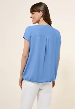 Blouse à manches courtes en couleur unie