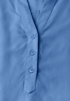 Blouse à manches courtes en couleur unie