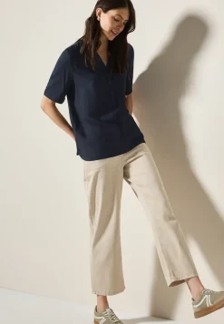 Blouse à manches courtes en couleur unie