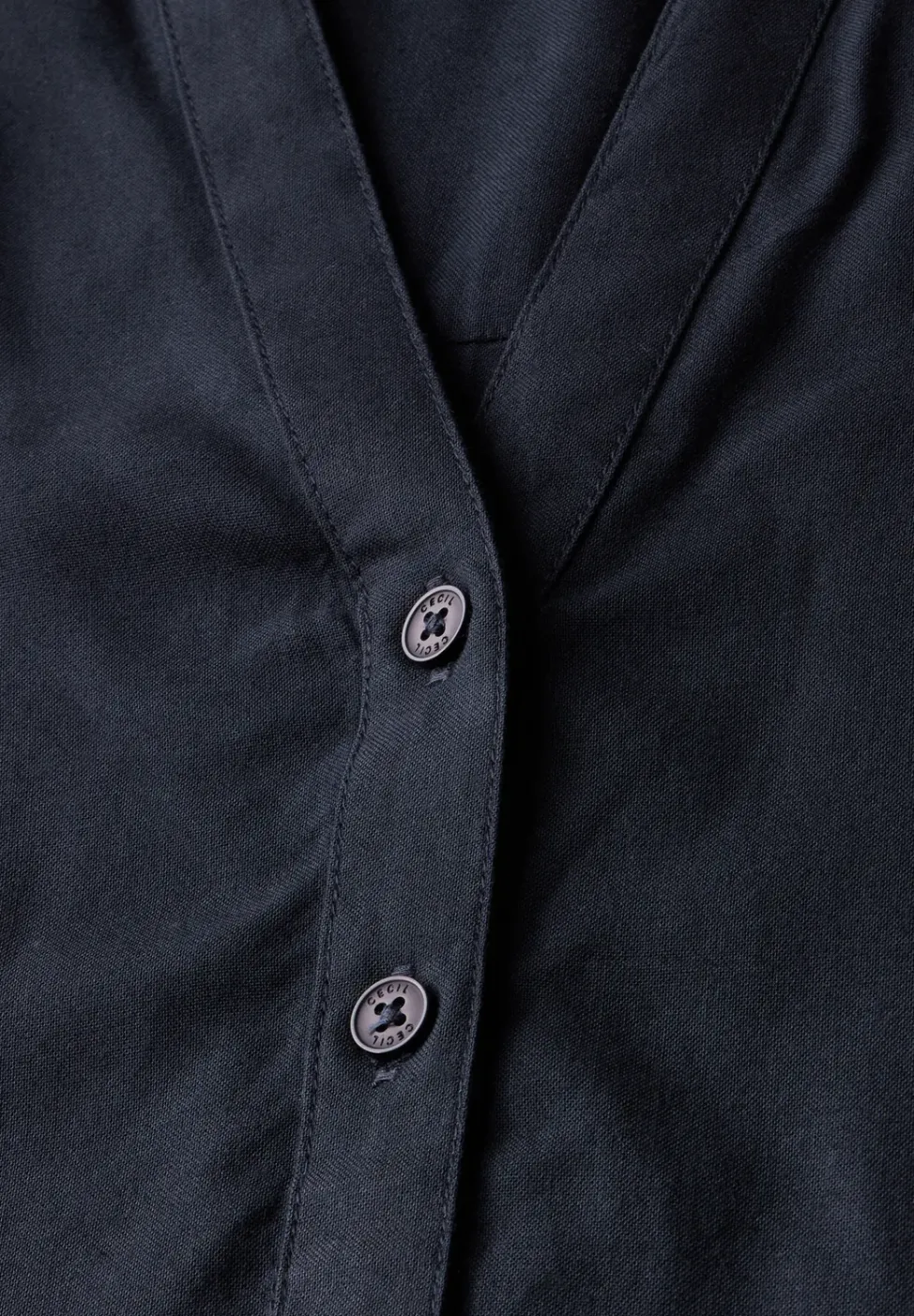 Blouse à manches courtes en couleur unie