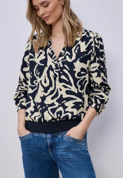 Blouse à manches longues avec ceinture élastique