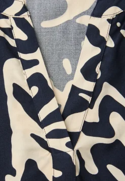 Blouse à manches longues avec ceinture élastique