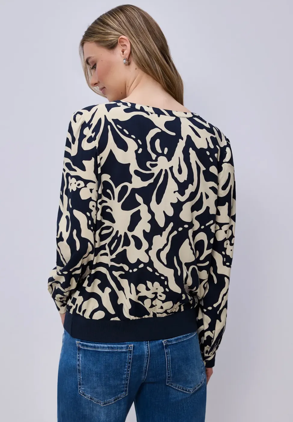 Blouse à manches longues avec ceinture élastique