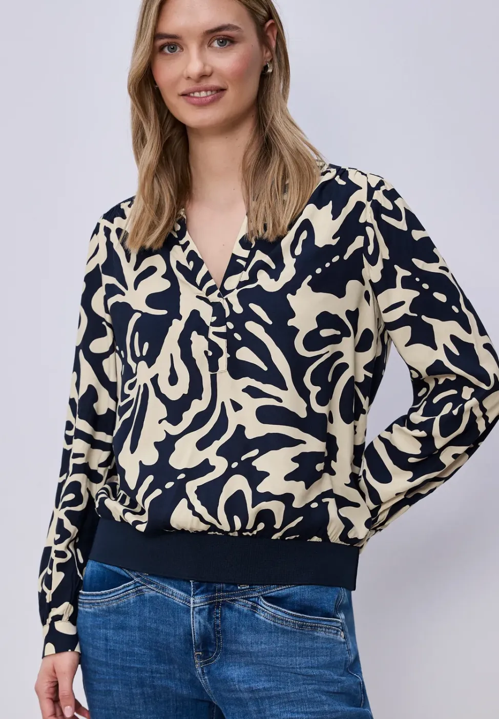 Blouse à manches longues avec ceinture élastique