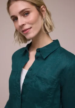 Blouse à manches longues avec poches sur la poitrine