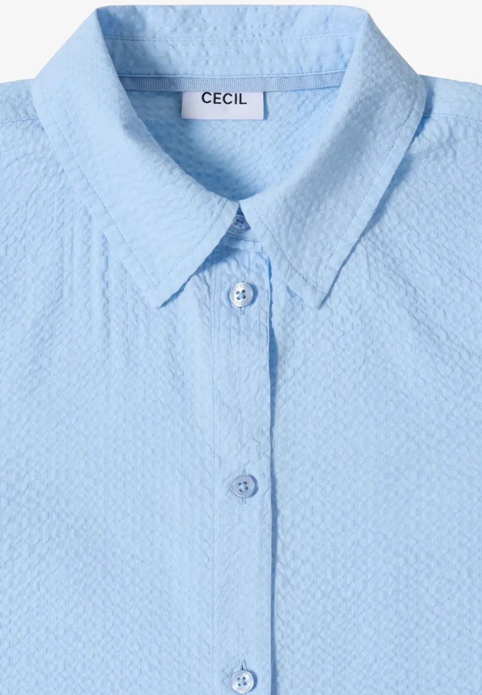 Blouse à manches longues avec structure et boutons