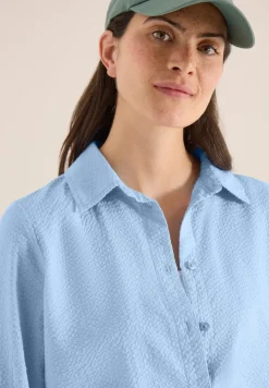 Blouse à manches longues avec structure et boutons